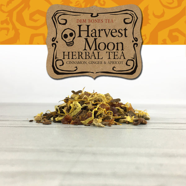 Herbal Tea in pile on white tile, Orange Spook Vine Graphics band with kraft label, DemBones Tea, Harvest Moon Herbal Tea, Cinnamon Ginger and Apricot, Halloween Gifts
