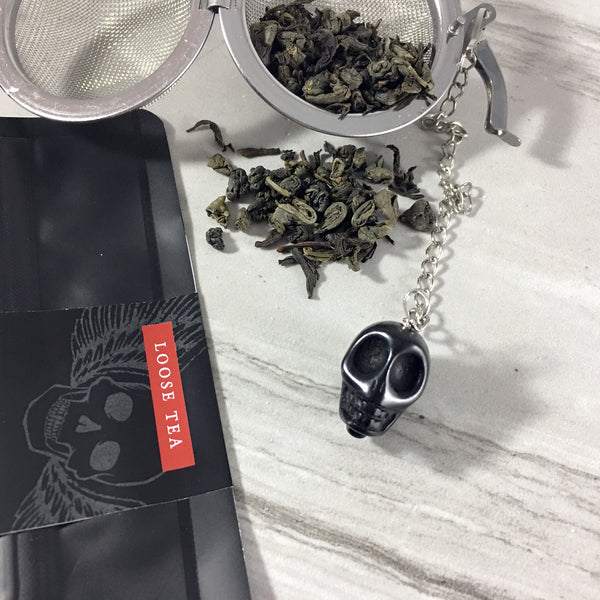 Loose Tea, Skull With Wings, Tea ball with tea spilling out, black skull tea ball charm
