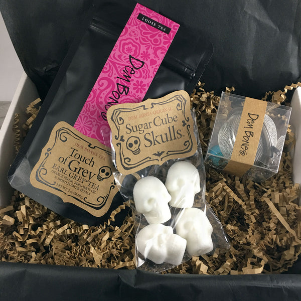 Tea and sugar cube skulls inside a Gift Box with back tissue and kraft crinkle paper 