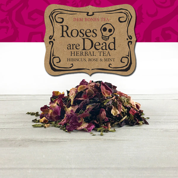 Kraft Label on Pink Graphics, Dem Bones Tea,  Roses Are Dead Herbal Tea, Hibiscus Rose & Mint, Skull , pile of herbal tea on white