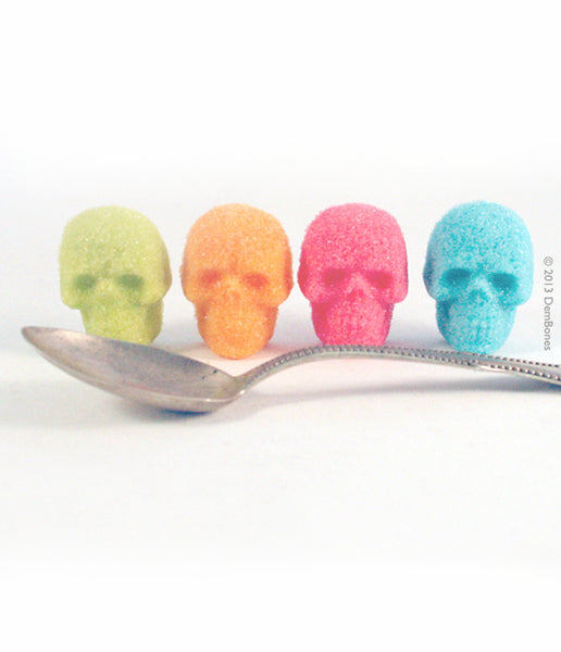 DemBones, Edible Sugar skulls, silver spoon, bright color sugar cubes, day of the dead.